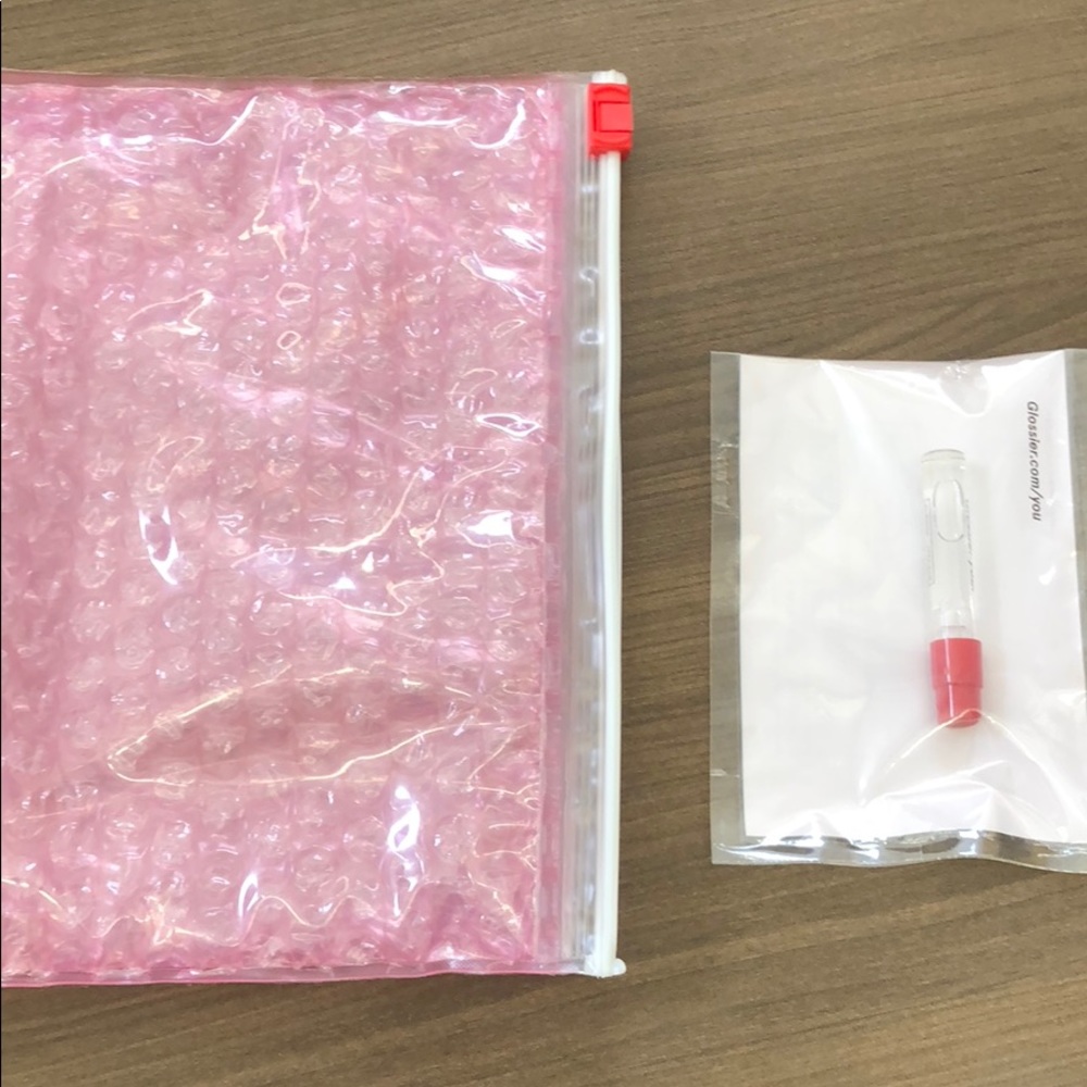 Pink Glossier bag (small) and Glossier You sample